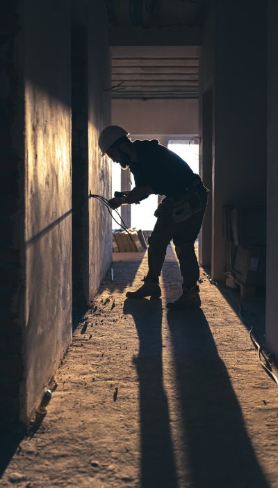 worker-is-cutting-wires-with-lineman-s-pliers